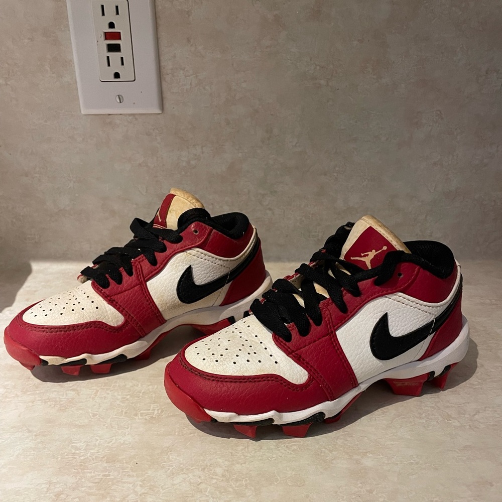 SOLD.  kids cleats
